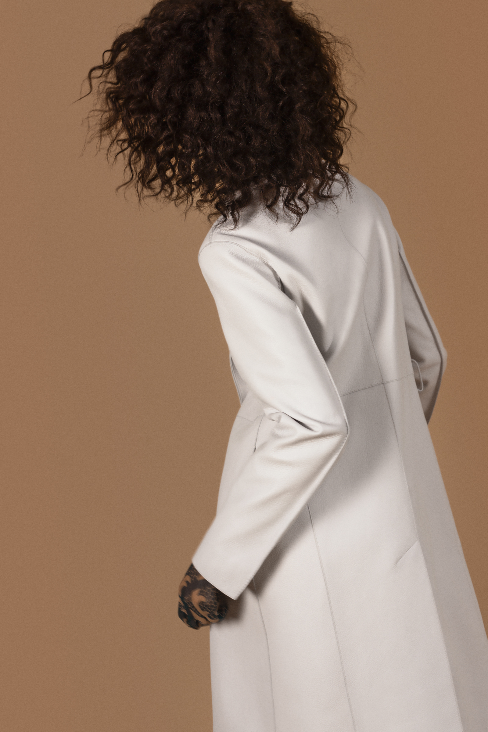 Muse — Coat Hermes Turtleneck & Glove Dries van Noten